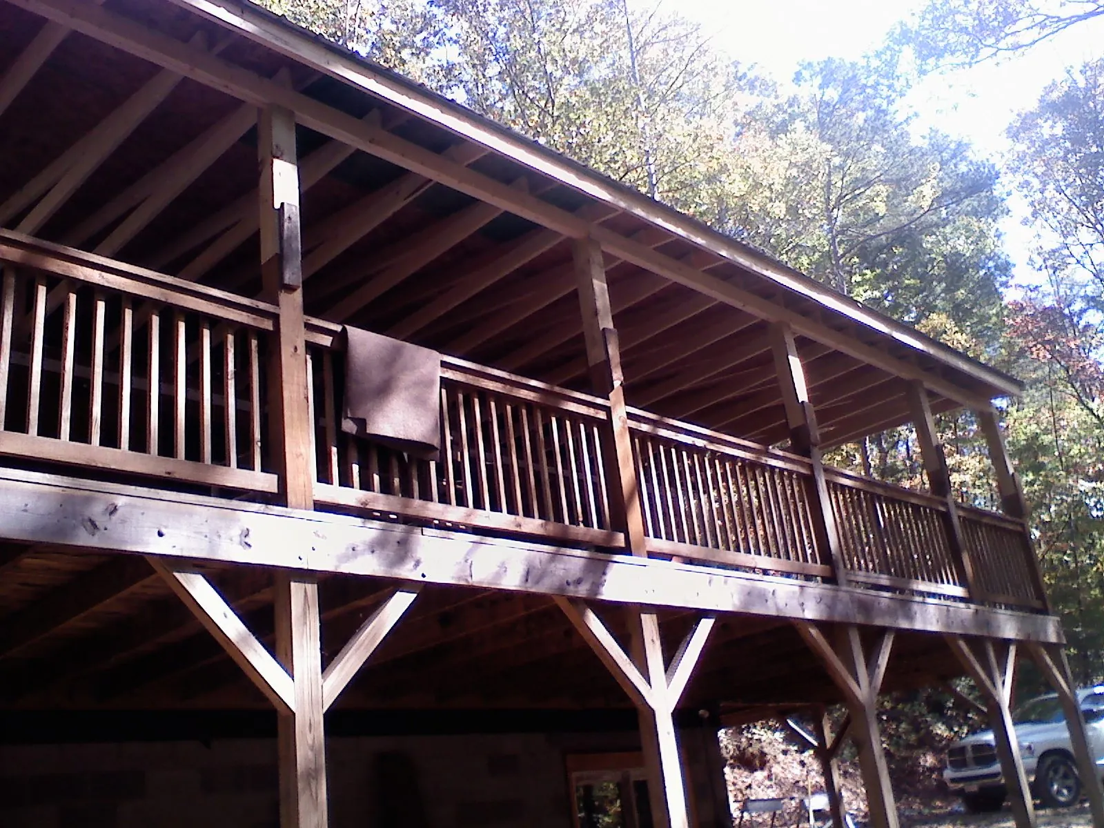 Timber framing under a new elevated porch and deck — Roof Leak Repair in Watauga by Roofing Brothers